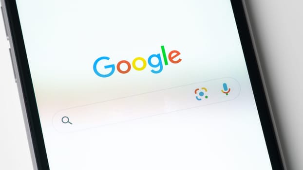 BAYONNE, FRANCE - CIRCA JANUARY 2021: Google app on Apple iPhone 6S screen. The google app gives access to the Google search engine.
