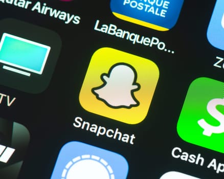 BAYONNE, FRANCE - CIRCA JANUARY 2021: Snapchat app icon on Apple iPhone screen. Snapchat is a multimedia messaging app developed by Snap Inc.