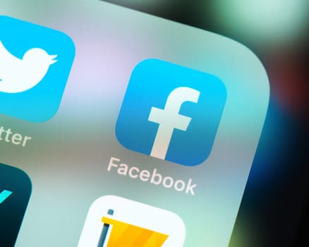 BAYONNE, FRANCE - CIRCA JANUARY 2021: Facebook app icon on Apple iPhone screen. Facebook is a social media service and technology company. Its CEO is Mark Zuckerberg.