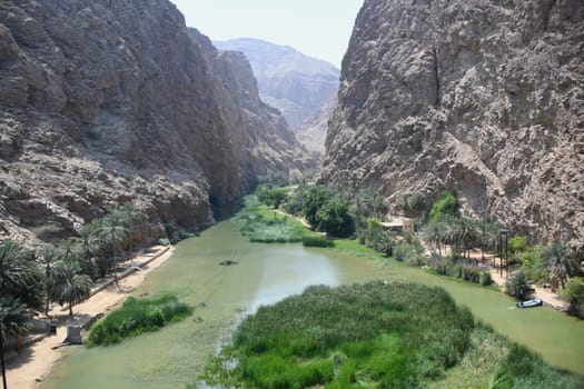 A view into Wadi Shab - Wadi ash Shab with its steep,deep gorge in Oman