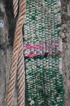An antique safety harness,a climbing aid in Al Hamra in Oman for climbing palms or trees.