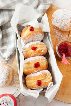 Delicious German donuts filled with jam and powderd sugar