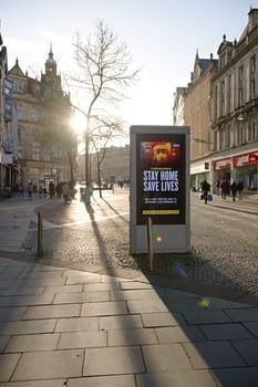 Sheffield, United Kingdom, 12th January, 2021: British Coronavirus government lock down advise displayed on a sheffield city advertising billboard.