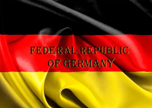 The Fabric texture of the flag of Germany. Close up