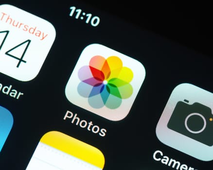 BAYONNE, FRANCE - CIRCA JANUARY 2021: Apple Photos app icon on Apple iPhone screen. Photos is a photo management and editing application.