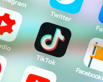 BAYONNE, FRANCE - CIRCA JANUARY 2021: TikTok app icon on Apple iPhone screen. TikTok is a video sharing social networking service owned by Chinese company ByteDance.