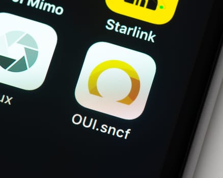 BAYONNE, FRANCE - CIRCA JANUARY 2021: Oui.sncf app icon on Apple iPhone screen.