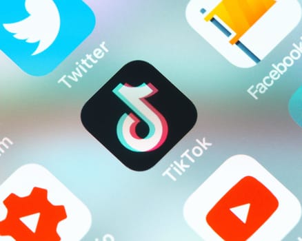BAYONNE, FRANCE - CIRCA JANUARY 2021: TikTok app icon on Apple iPhone screen. TikTok is a video sharing social networking service owned by Chinese company ByteDance.