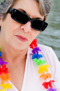 Close-up of a senior woman wearing sunglasses