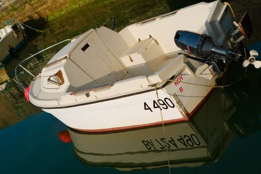Reflection of a motorboat in water