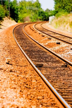 Railroad track passing through a landscape