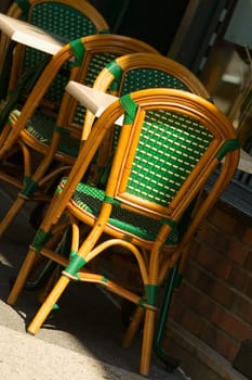 Tables and chairs at a sidewalk cafe