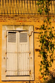 Close-up of a closed window on a wall