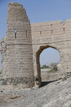 The great fortress Hisn Tamah,built in the 17th century in the oasis city of Bahla,is located at the foot of the Jabal al Achdar Mountains. It was built from traditional building materials.