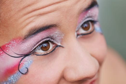 Close-up of a young woman with a painted face