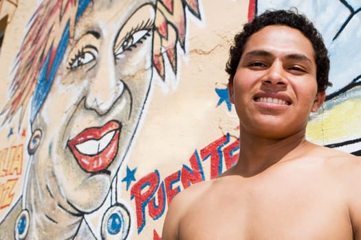 Portrait of a bare chested young man posing