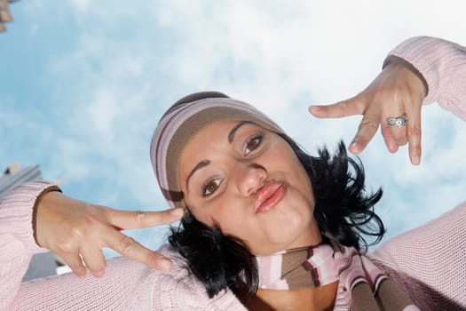 Low angle view of a mid adult woman gesturing
