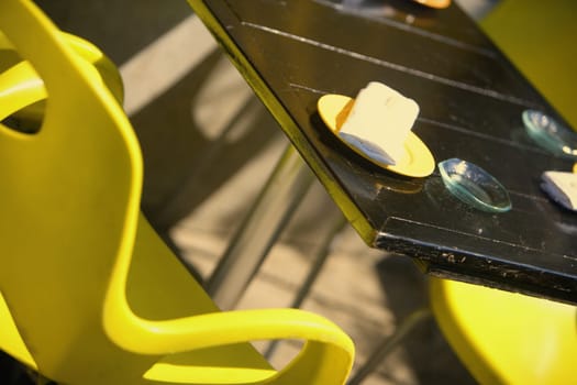 High angle view of chairs around a table