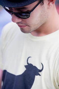 Close-up of a young man looking down