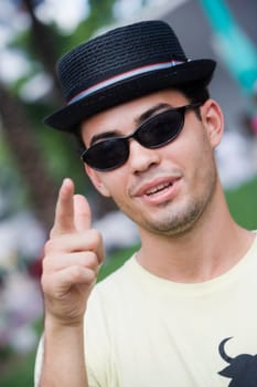 Close-up of a young man pointing