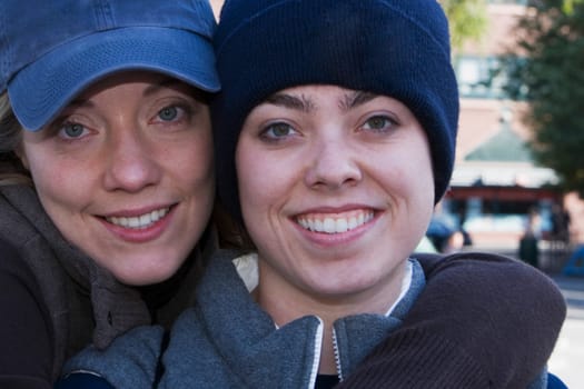 Portrait of two young women smiling