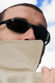 Close-up of a man wearing sunglasses