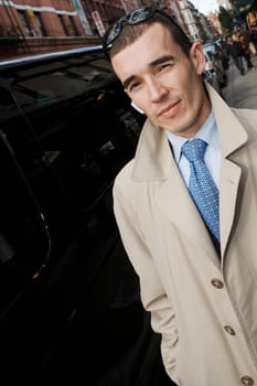 Portrait of a businessman on the sidewalk