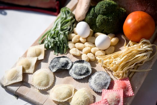 High angle view of vegetables and cookies with eggs in a serving tray