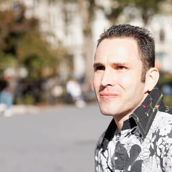 Close-up of a mid adult man looking away