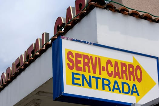 Drive-through sign, Spanish