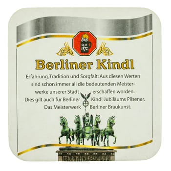 BERLIN, GERMANY - MARCH 15, 2015: Beermat of German beer Berliner Kindl isolated over white background