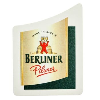 BERLIN, GERMANY - MARCH 15, 2015: Beermat of German beer Berliner Pilsner  isolated over white background