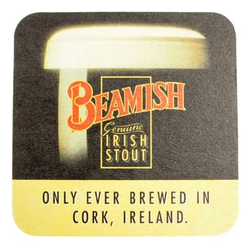 DUBLIN, IRELAND - MARCH 15, 2015: Beermat of Irish stout beer Beamish isolated over white background