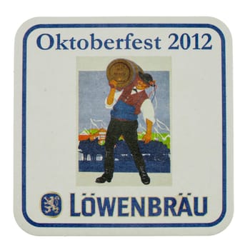 BERLIN, GERMANY - MARCH 15, 2015: Beermat of German beer Loewenbraeu isolated over white background