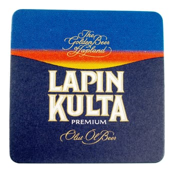HELSINKI, FINLAND - MARCH 15, 2015: Beermat of Finnish beer Lapin Kulta isolated over white background