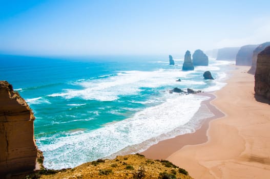 The Twelve Apostles, a famous collection of limestone stacks off the shore of the Port Campbell National Park, by the Great Ocean Road in Victoria, Australia