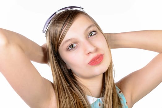 portrait of a smiling teenager on a white background