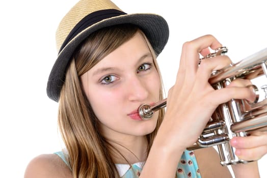 teenager with a hat plays the trumpet