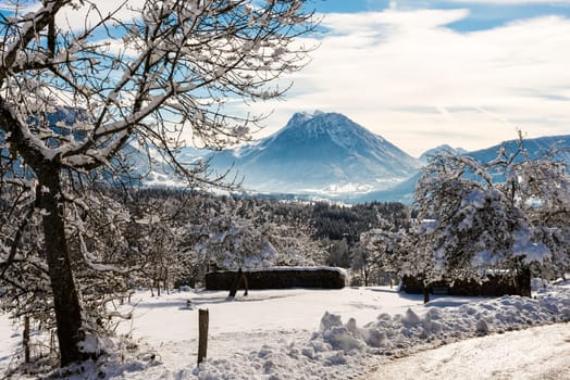 a wintry landscape with snow in mountain