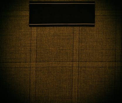 dark gold background of textile texture. close up