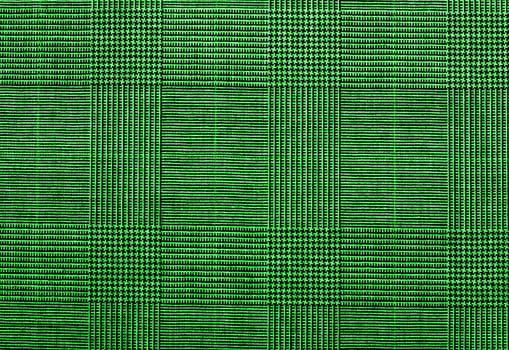 green background of textile texture. close up