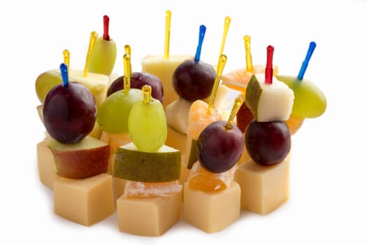 Isolated on white canapes and fruit