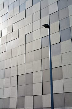 Facade of a modern building with street lamp in Magdeburg