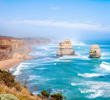 The Twelve Apostles, a famous collection of limestone stacks off the shore of the Port Campbell National Park, by the Great Ocean Road in Victoria, Australia