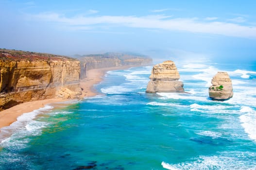 The Twelve Apostles, a famous collection of limestone stacks off the shore of the Port Campbell National Park, by the Great Ocean Road in Victoria, Australia