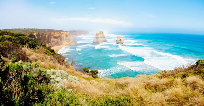 The Twelve Apostles, a famous collection of limestone stacks off the shore of the Port Campbell National Park, by the Great Ocean Road in Victoria, Australia