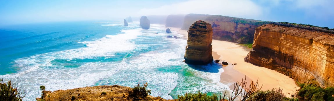 The Twelve Apostles, a famous collection of limestone stacks off the shore of the Port Campbell National Park, by the Great Ocean Road in Victoria, Australia