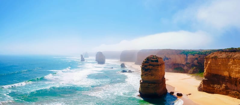 The Twelve Apostles, a famous collection of limestone stacks off the shore of the Port Campbell National Park, by the Great Ocean Road in Victoria, Australia