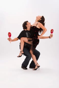 Studio portrait of couple dancing