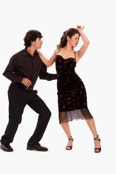 Studio portrait of couple dancing
